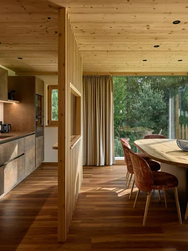 Living room and kitchen Chalet La Varieté in Alta Badia, Dolomites